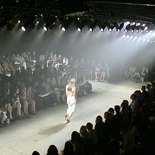 Model walking on stage Eyebeam Fashion Show